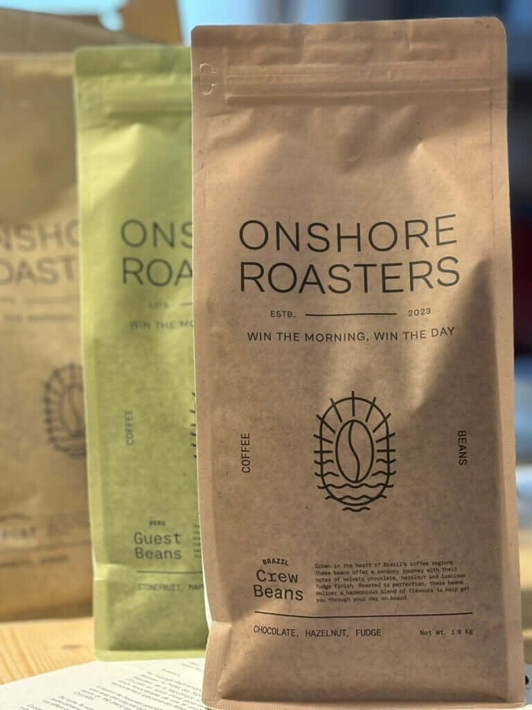 Bags of Crew Beans and Guest Beans, fresh from the roaster